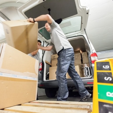 Team Outsourcing & Solutions bei der Arbeit
